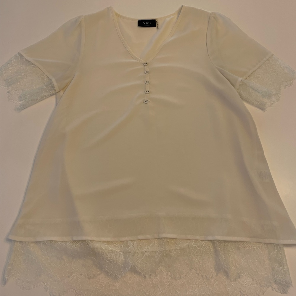 Vici. Small. Lined, short sleeve blouse with lace trim. Cream/ivory.